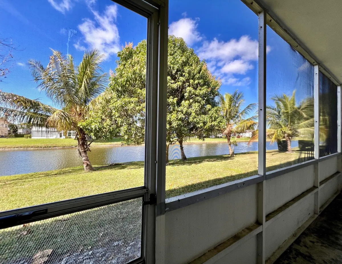 Screened Lanai with WATER VIEWS at 240 Bedford J, West Palm Beach