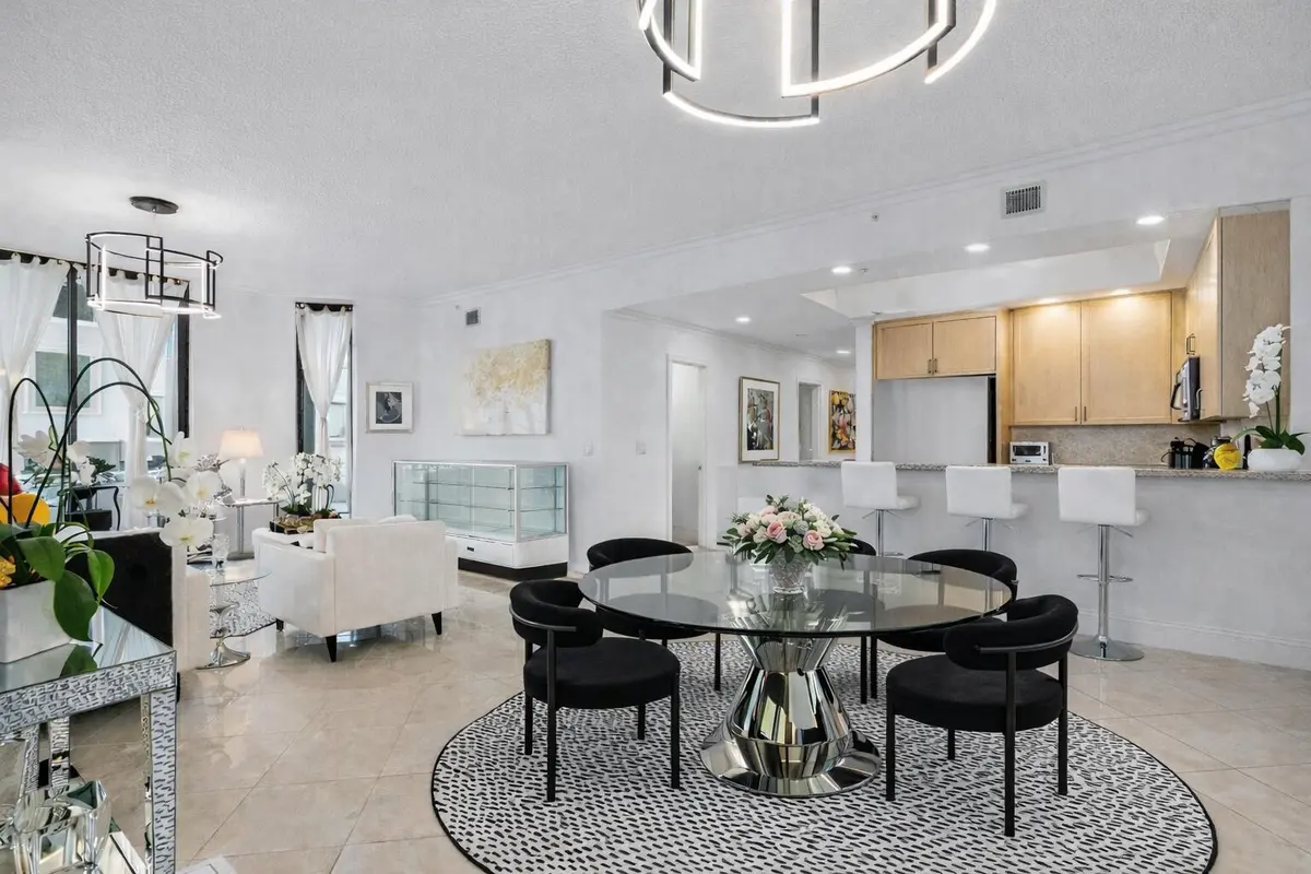 Dining Area w/ New Italian Table at 701 S Olive Avenue 928, West Palm Beach