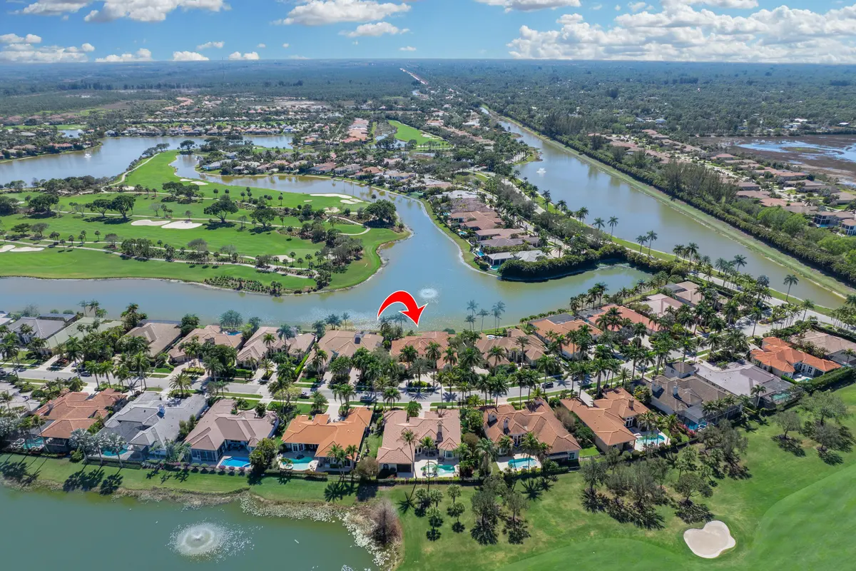 Wide lake view. No houses behind at 7546 Hawks Landing Drive, West Palm Beach