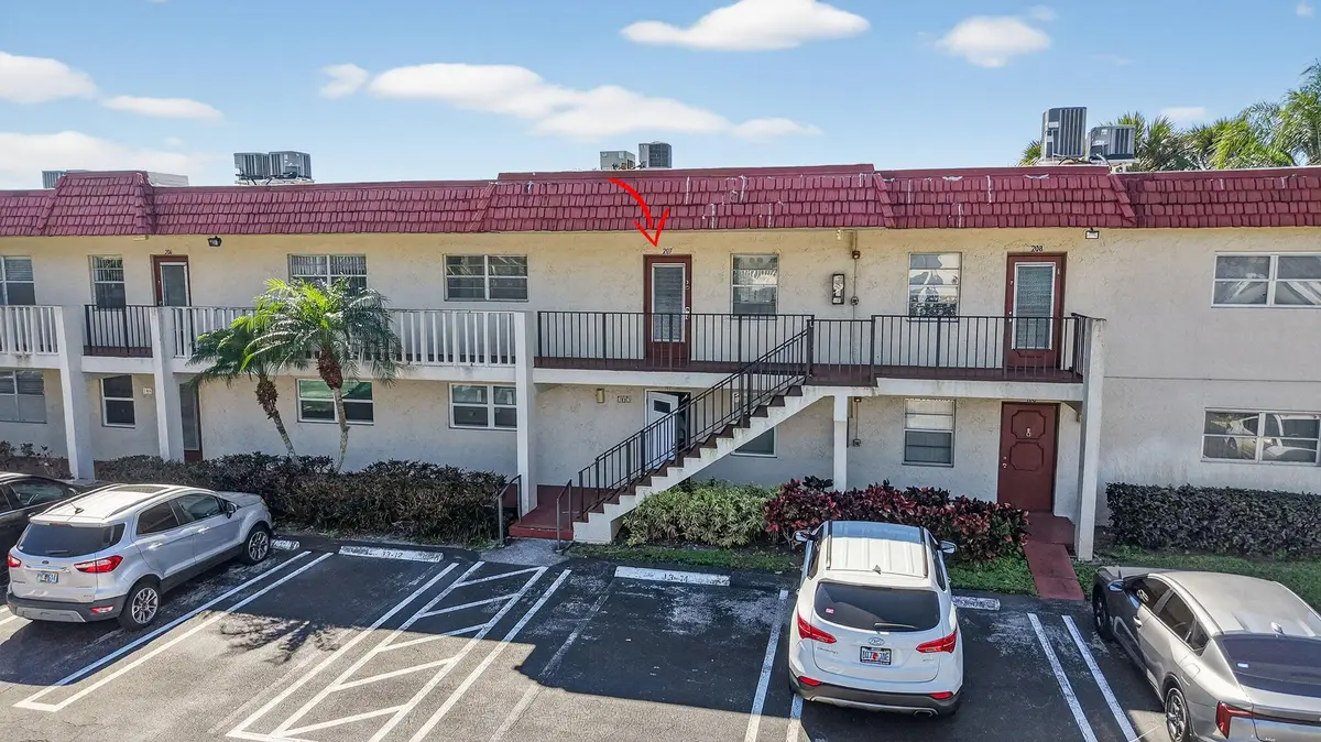 1-web-or-mls-DJI_20260224105445_0226_D at 33 Abbey Lane 207, Delray Beach
