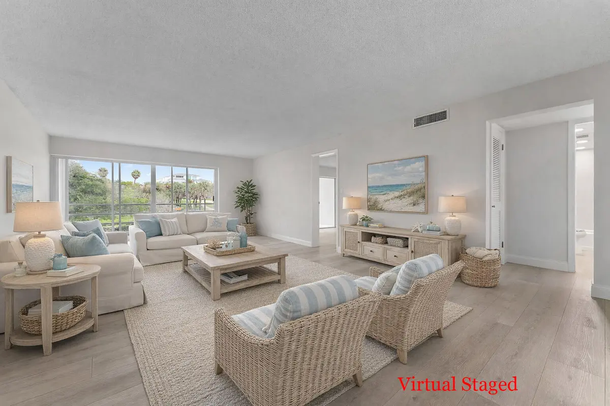 Coastal-inspired living room with beach at 20 Celestial Way 215, Juno Beach