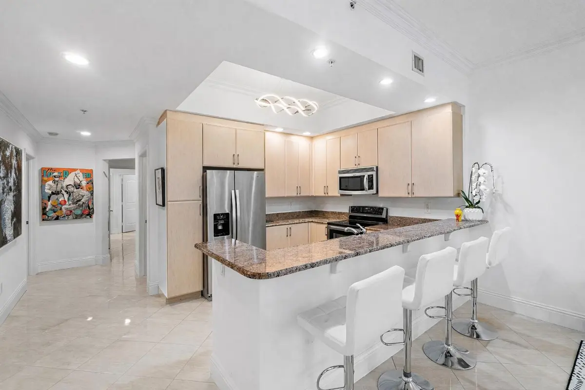 Spacious Kitchen w/ Sunset Views at 701 S Olive Avenue 928, West Palm Beach