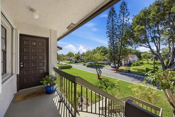 Front door at 21364 Cypress Hammock Drive 1j, Boca Raton