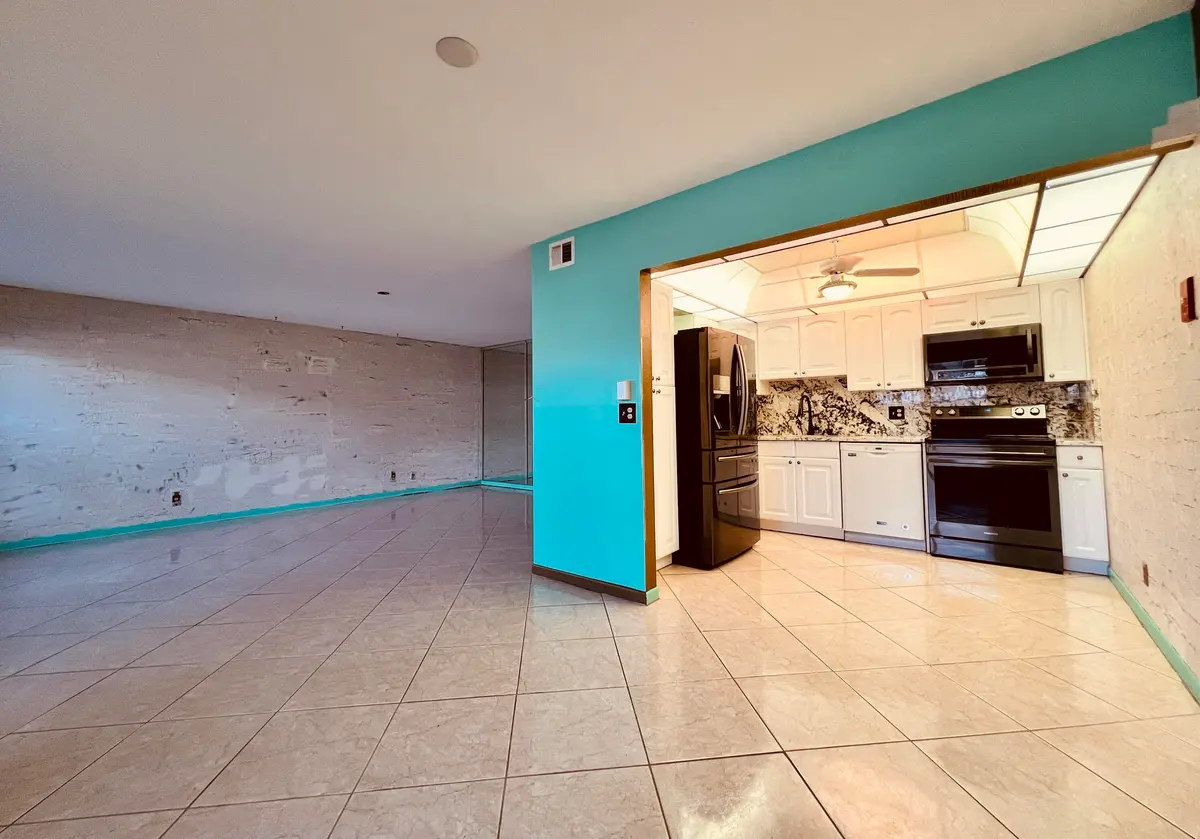 Dining to Living at 110 Wellington B, West Palm Beach