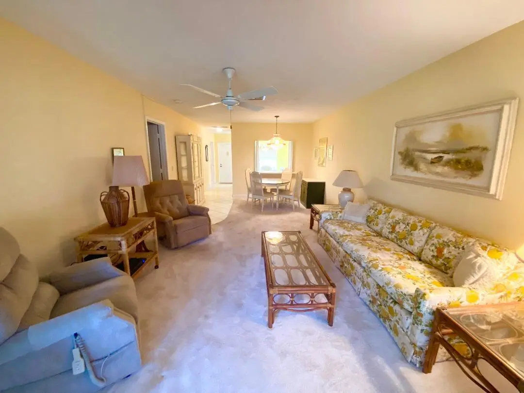 Living room to dining area at 2331 Croton Lane B, Delray Beach