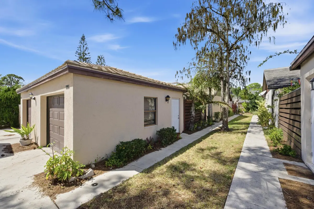Walkway to Unit at 1205 Periwinkle Place, Wellington