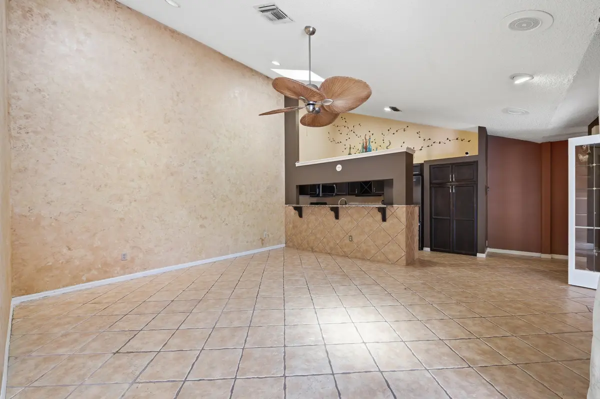 Living Room with Terrazzo floors at 1205 Periwinkle Place, Wellington