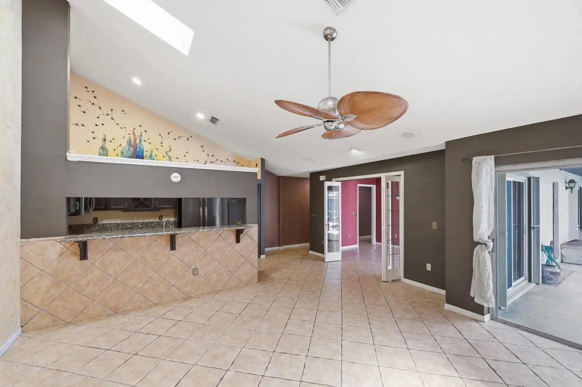Living Rm. looking toward Kit. and DR at 1205 Periwinkle Place, Wellington
