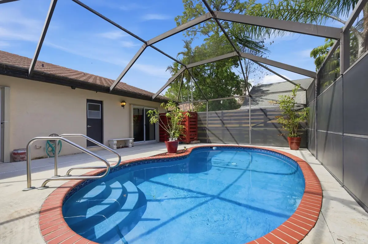 Pool/Patio Entrance at 1205 Periwinkle Place, Wellington