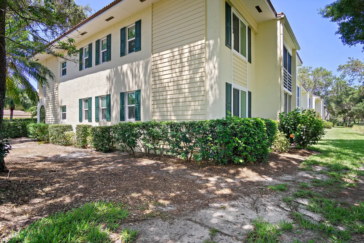 9a. Side View end unit at 12457 Harbour Ridge Boulevard 27, Palm City