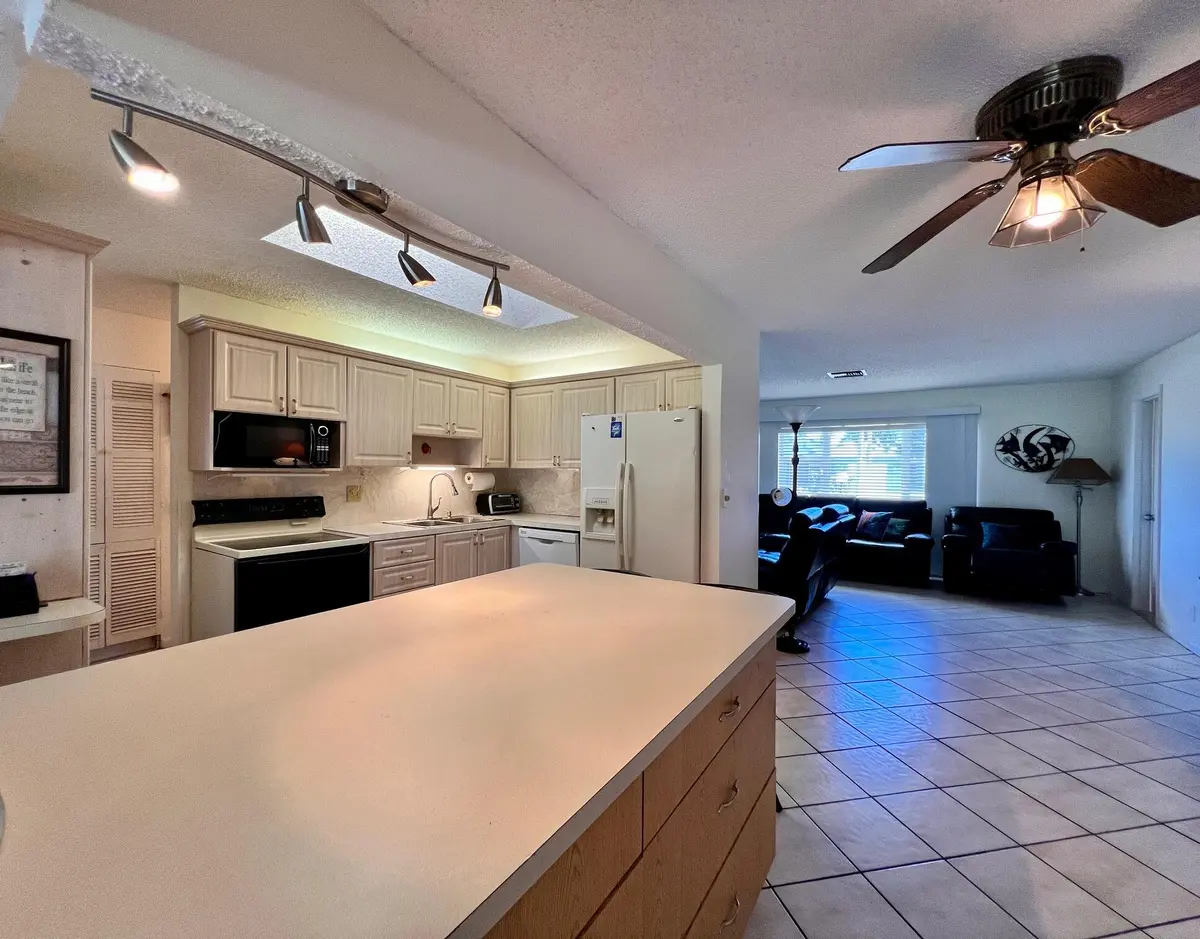 Kitchen to Living at 3465 Amalfi Drive, West Palm Beach