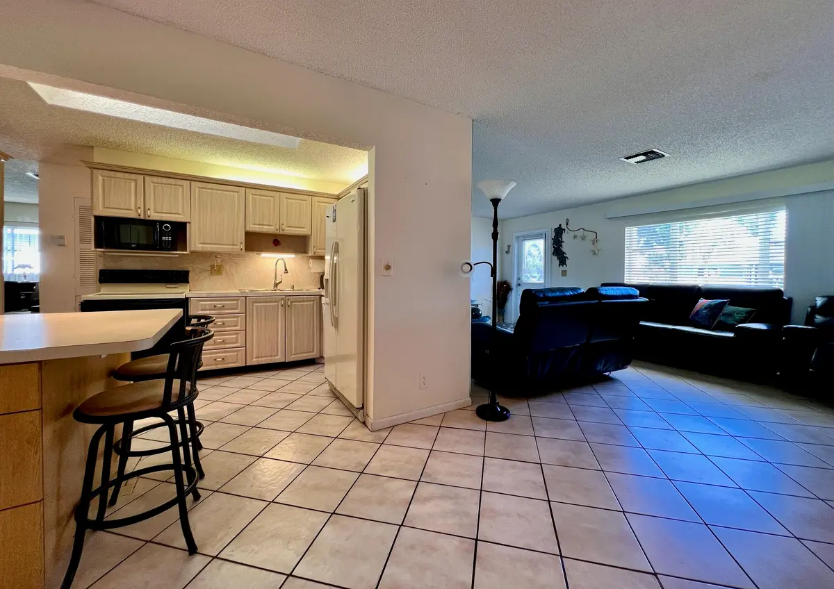 Kitchen and Living Area at 3465 Amalfi Drive, West Palm Beach