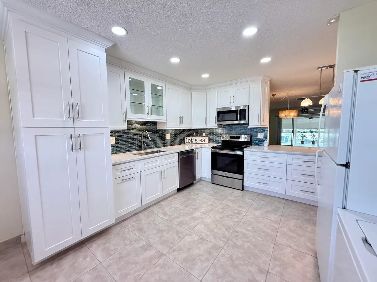 UPDATED OPEN KITCHEN at 1740 NW 19th Terrace 202, Delray Beach