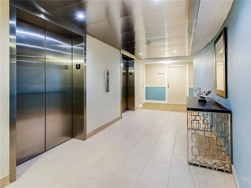 Hallway & elevators at 2000 S Ocean Boulevard 7J, Lauderdale-By-The-Sea