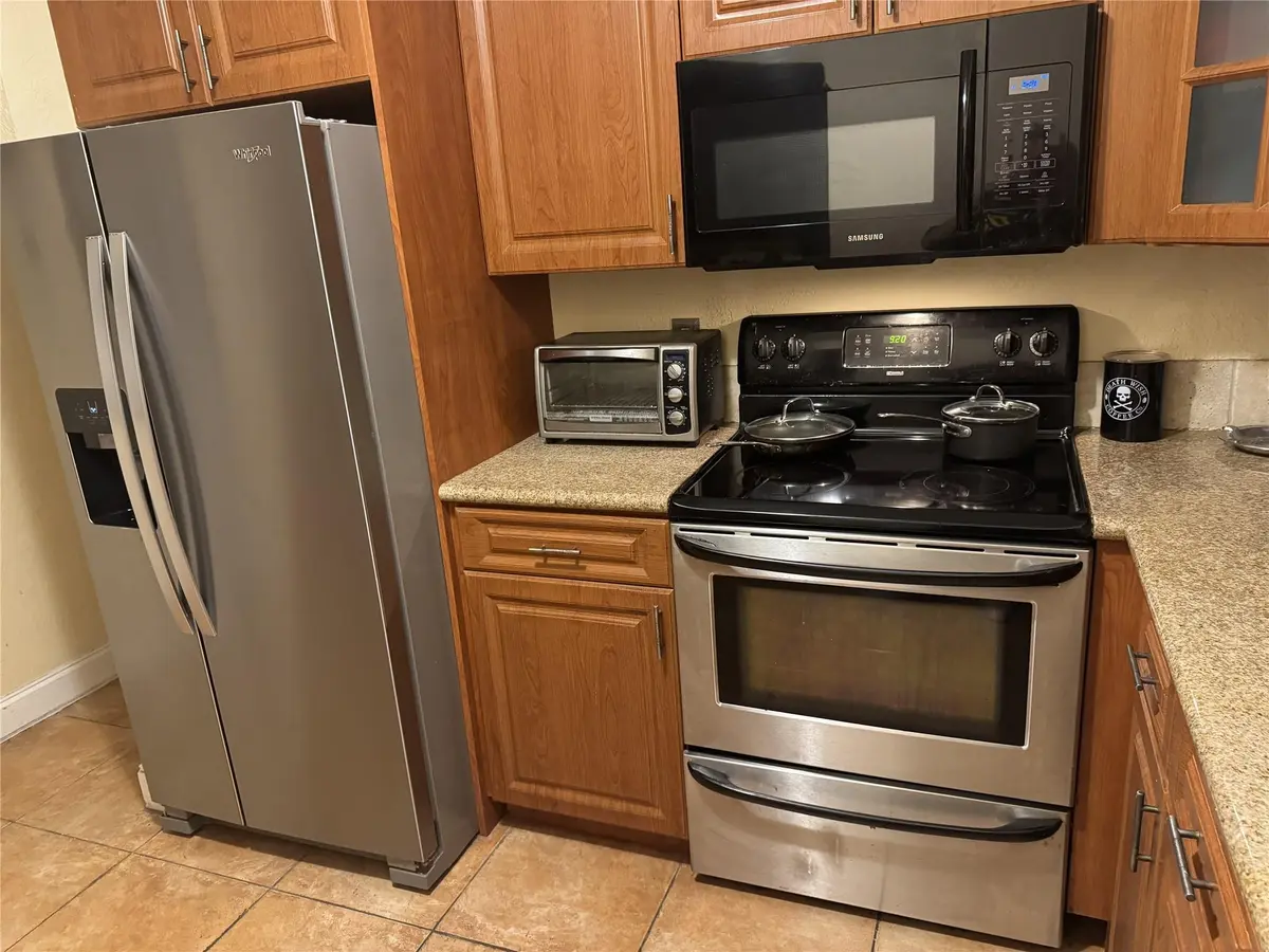 Photo 7 at 1668 Cypress Pointe Drive 1668, Coral Springs
