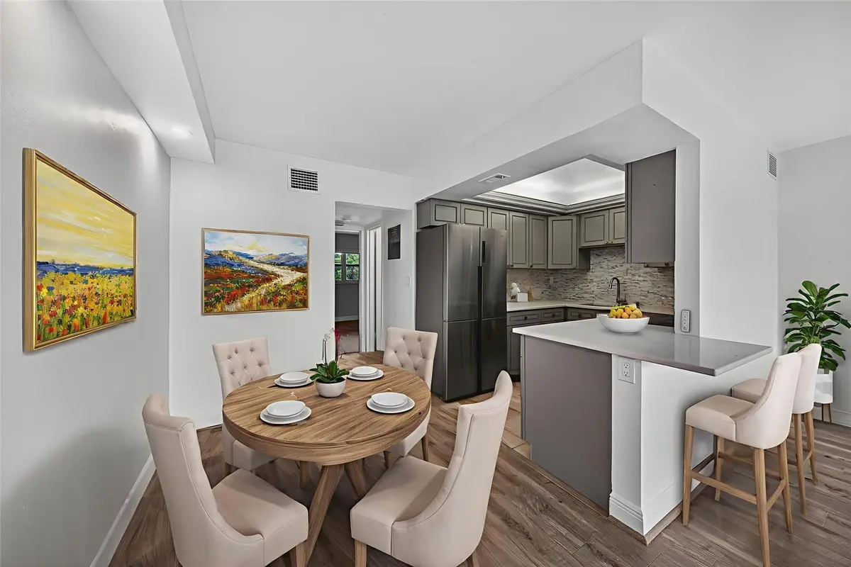 Dining Area virtually staged at 4836 NE 23 Avenue 17, Fort Lauderdale