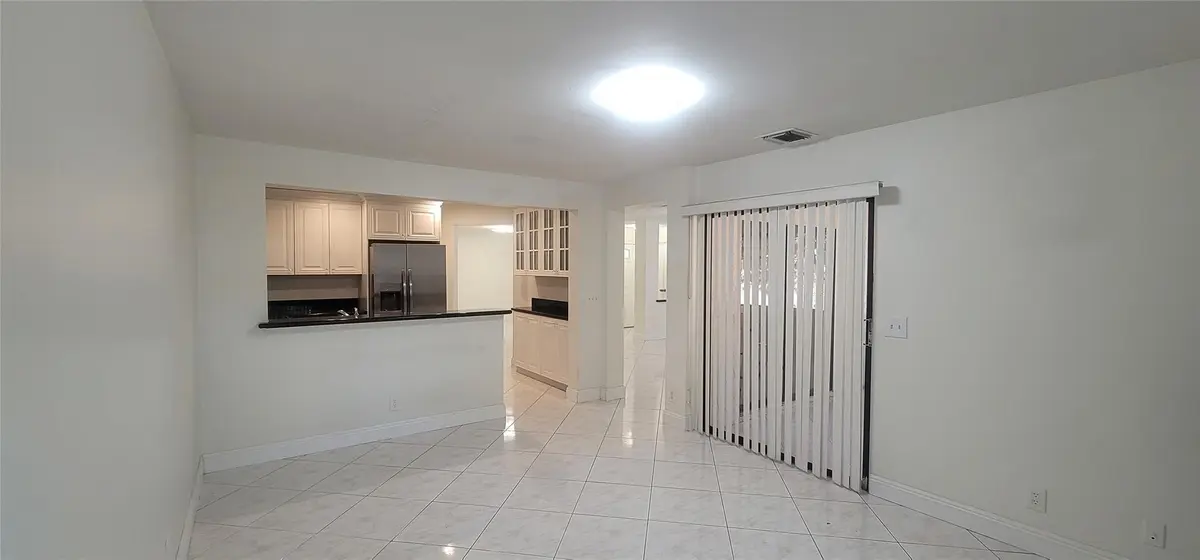 Family room at 3380 NW 22nd Court, Coconut Creek