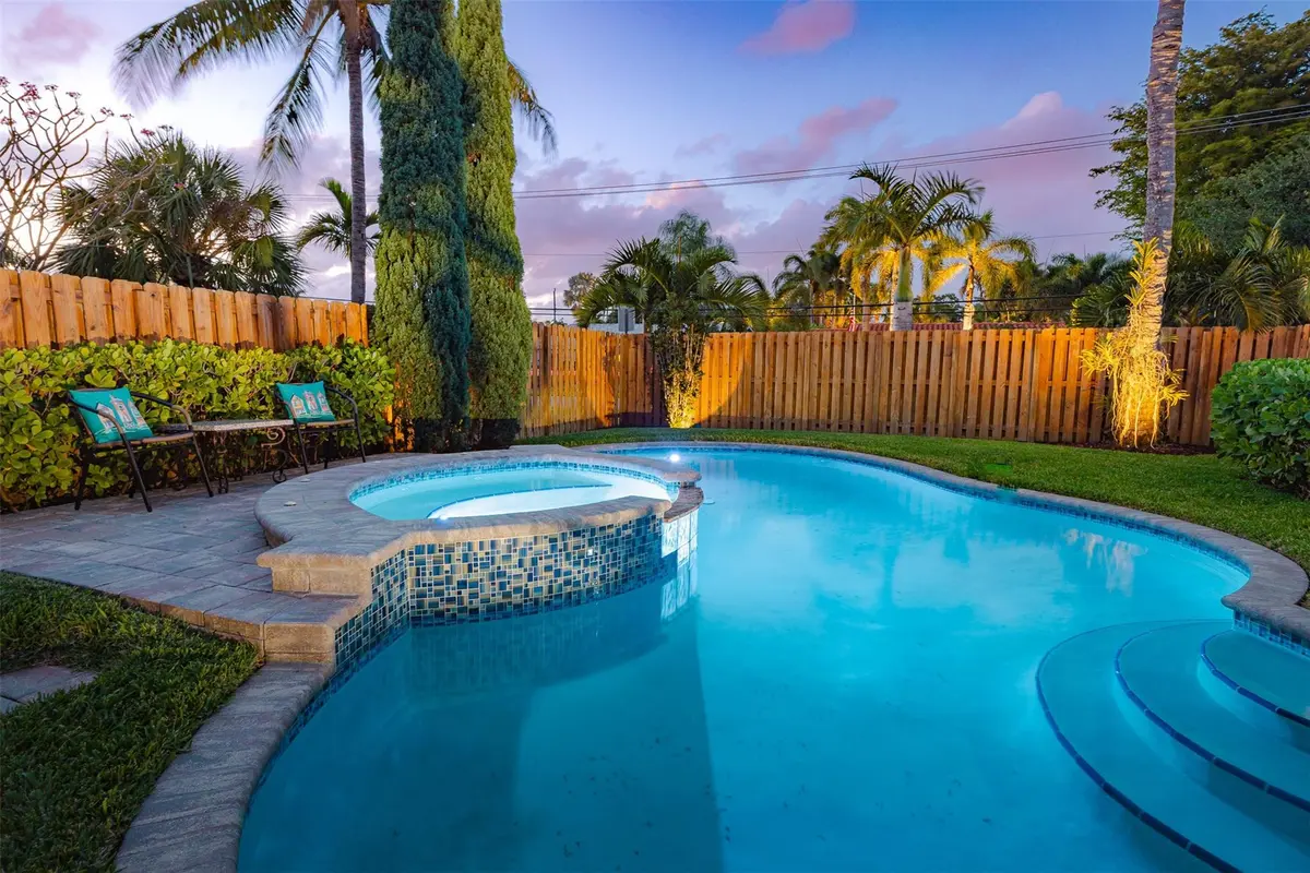 Custom pool with multi color lights at 1924 NE 18th Street, Fort Lauderdale