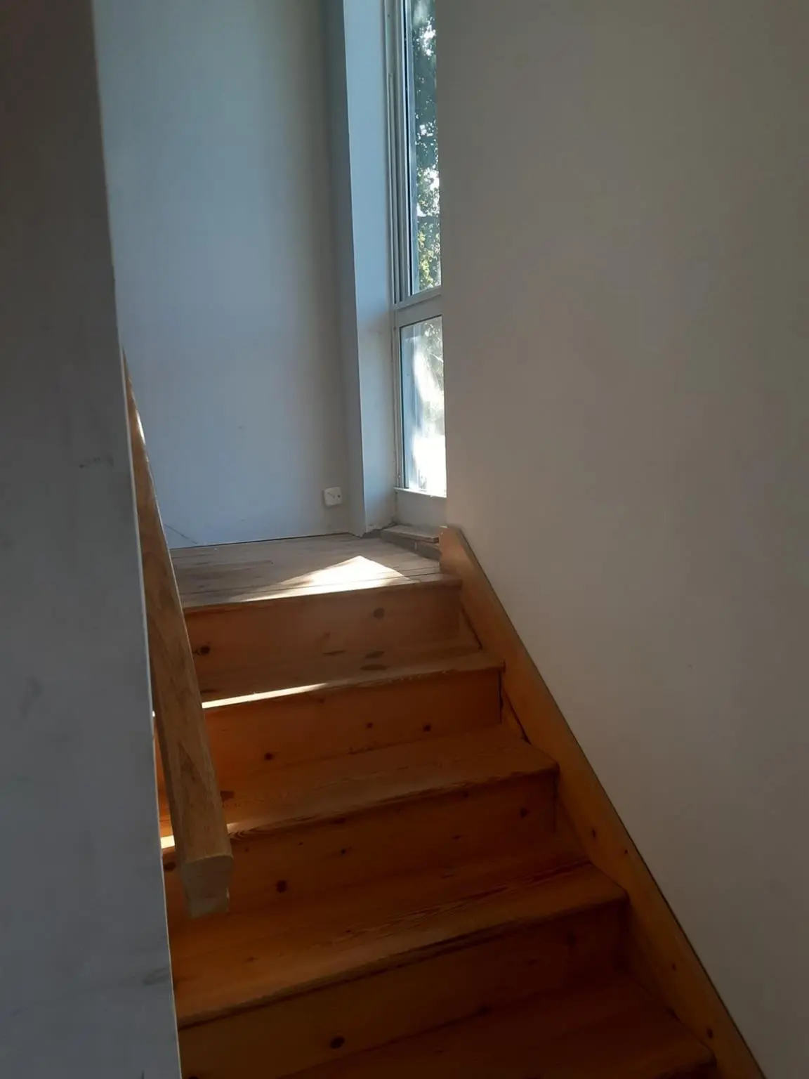 Stairs next to front door at 799 NE 34th Court, Oakland Park