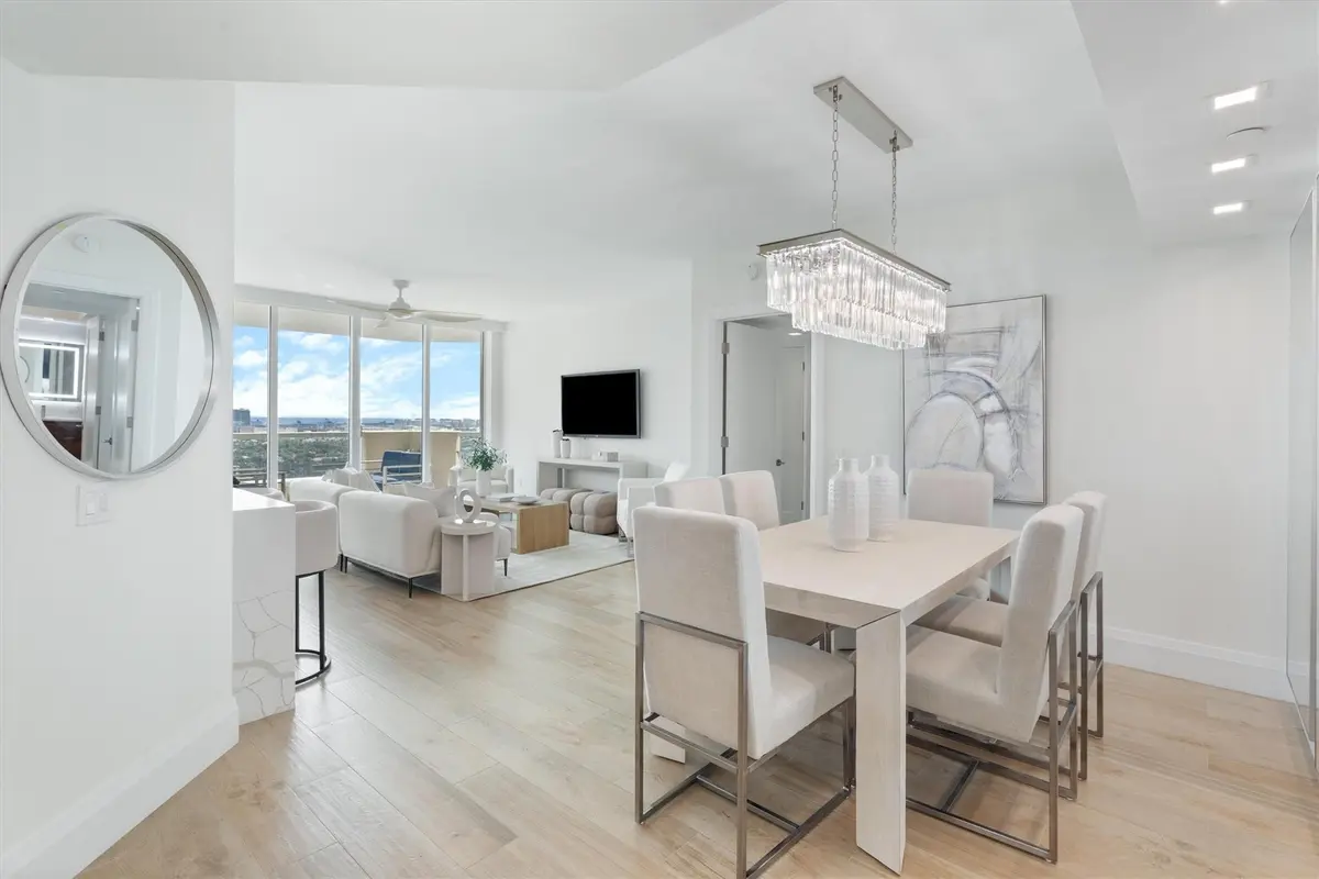 Elegant dining room with stunning views at 411 N New River Drive 2805, Fort Lauderdale