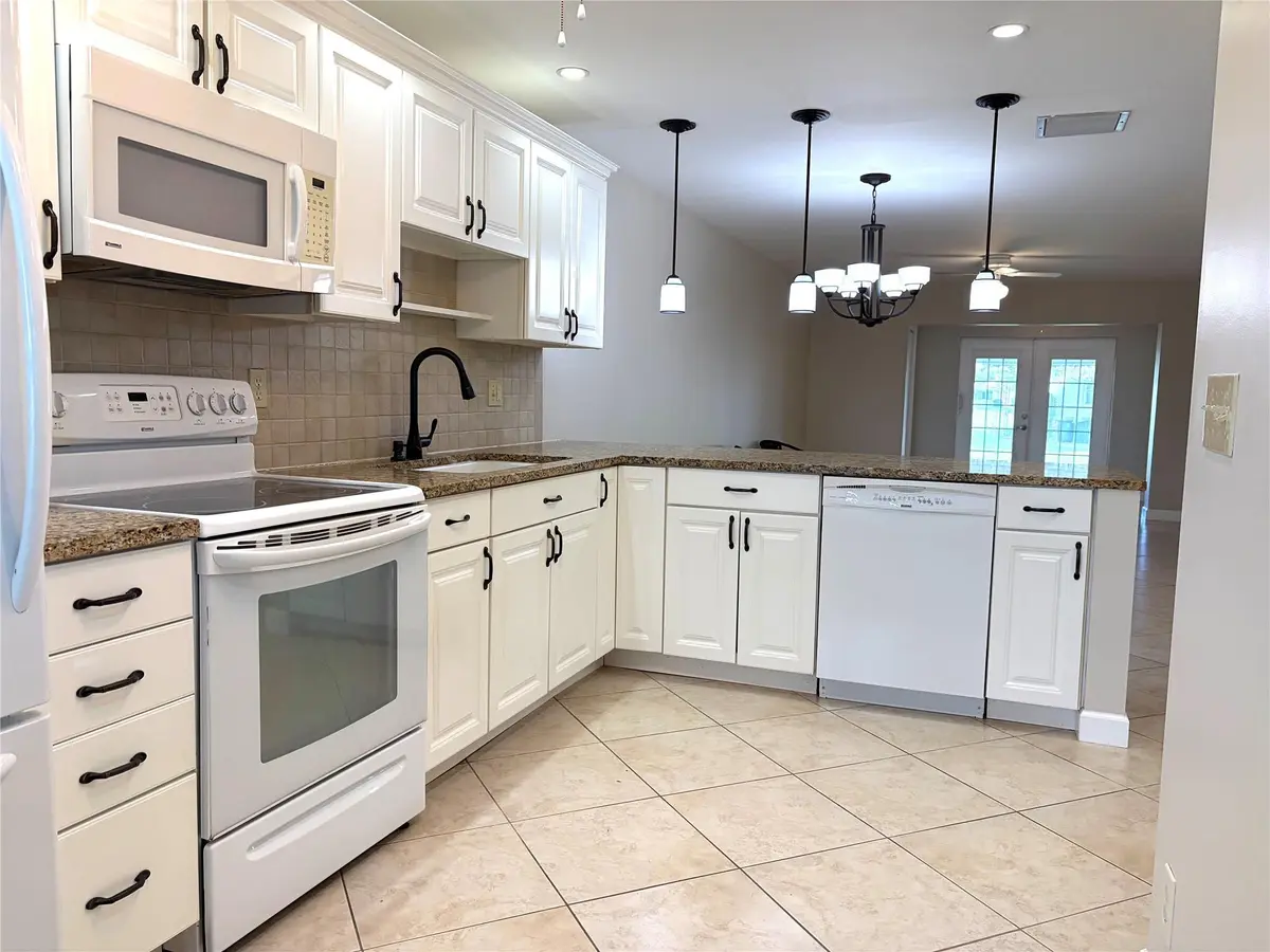 Beautiful real wood white cabinets. at 8701 NW 11th Street 8701, Plantation