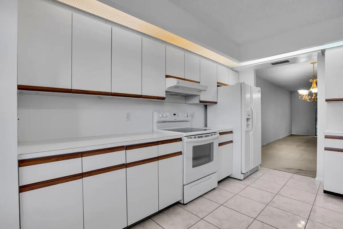 KITCHEN Many Cabinets at 1501 Cayman Way C2, Coconut Creek