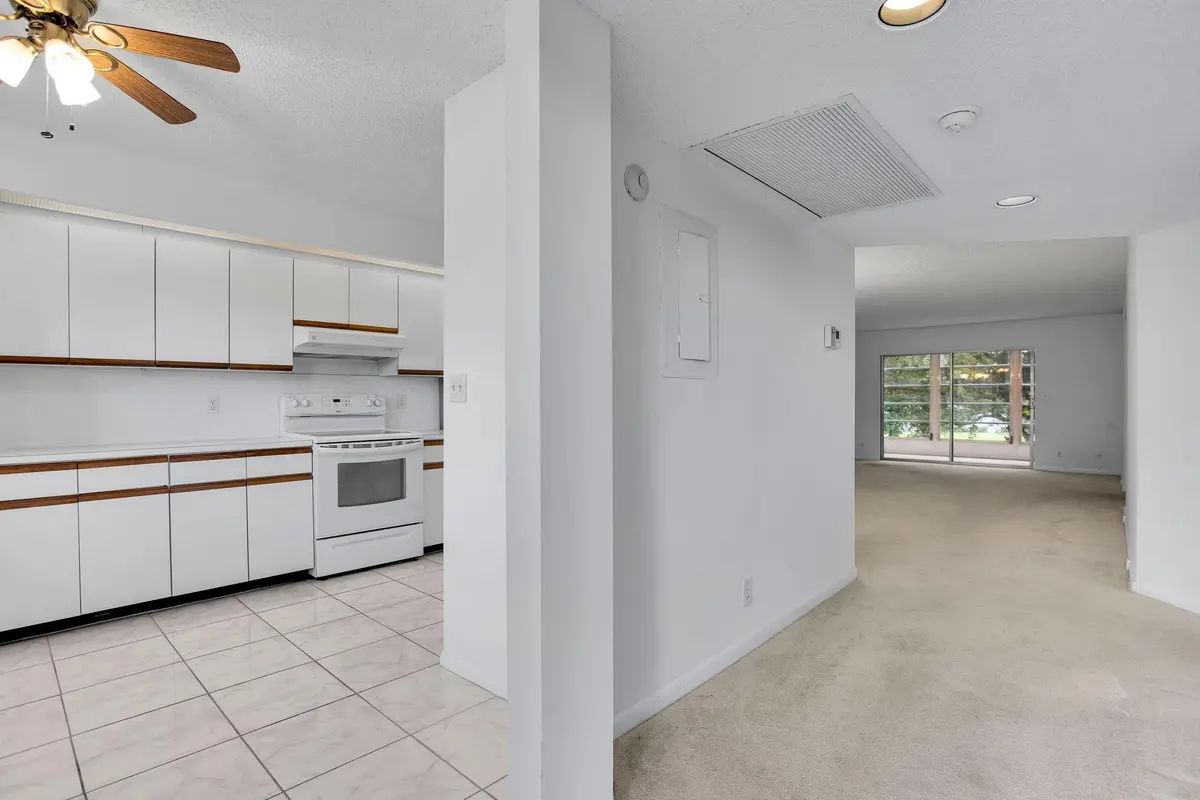 Enter Kitchen & Foyer at 1501 Cayman Way C2, Coconut Creek
