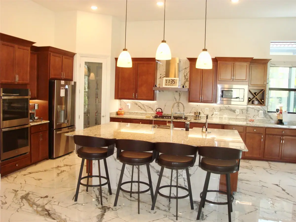 Photo 3 at 9265 Porto Way, Parkland