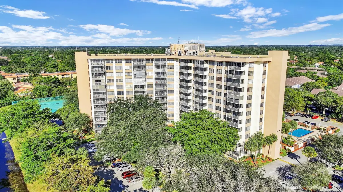 Photo 7 at 10777 W Sample Road 711, Coral Springs