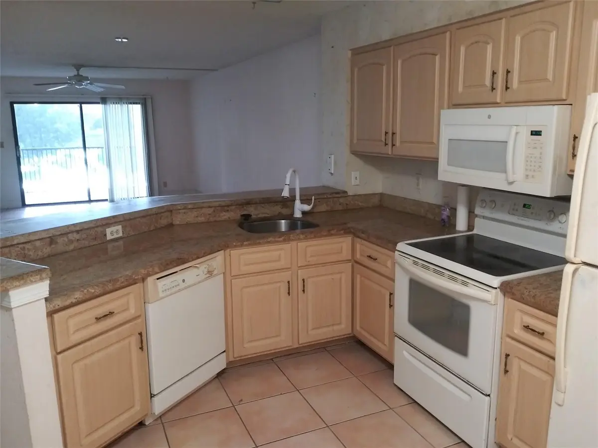 Photo 8 at 2112 S Cypress Bend Drive 207, Pompano Beach
