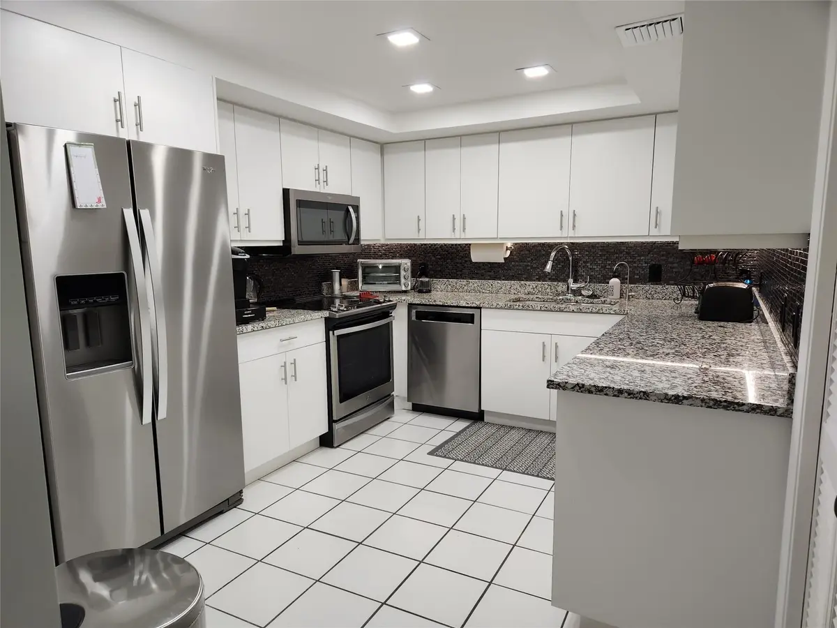 Newly remodeled Kitchen at 16100 Golf Club Road 301, Weston