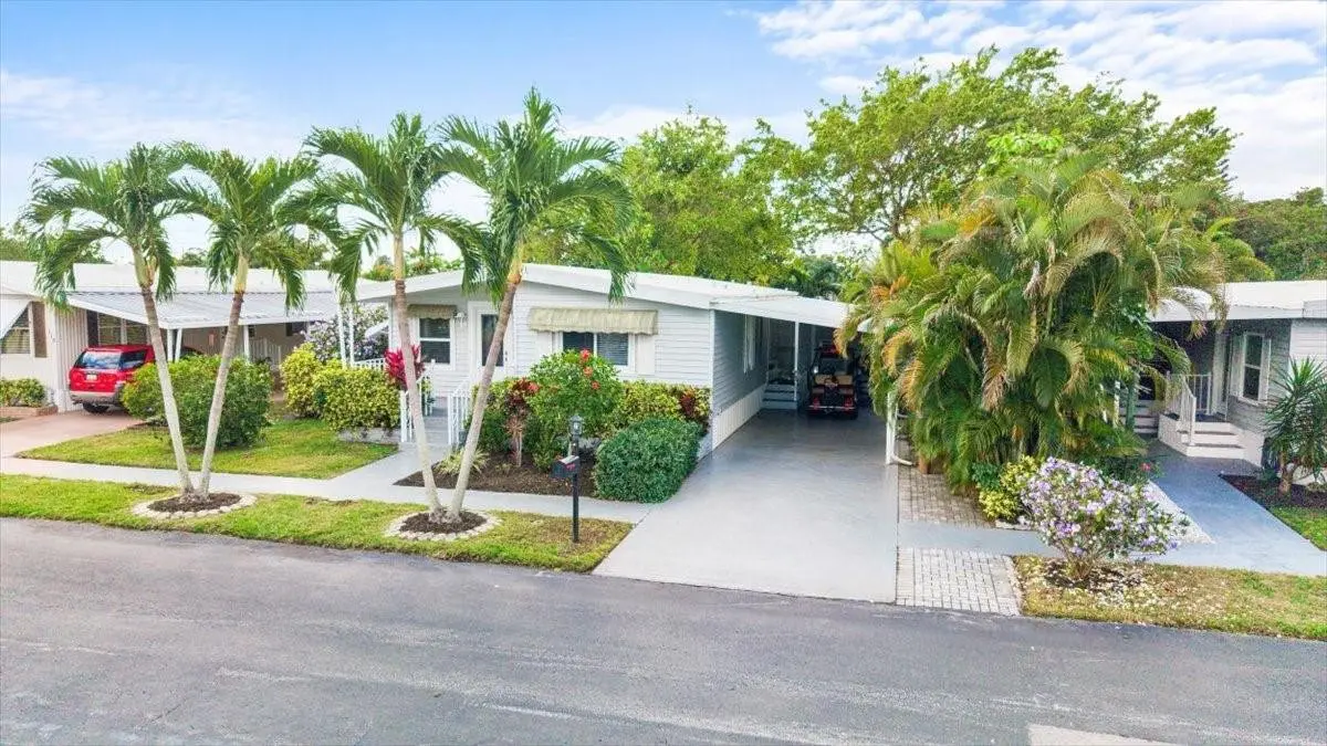 Photo 1 at 120 NW 51st Street, Deerfield Beach