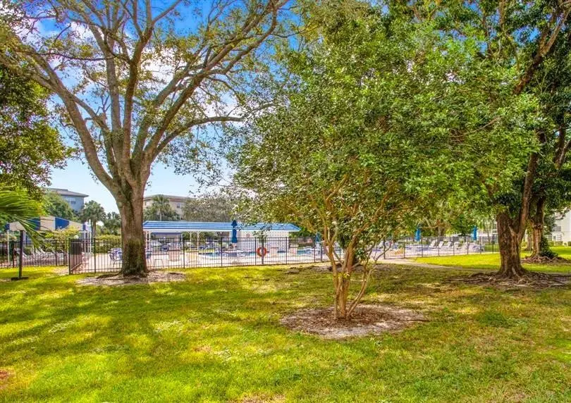 Garden/Pool View at 3001 Portofino Isle E2, Coconut Creek