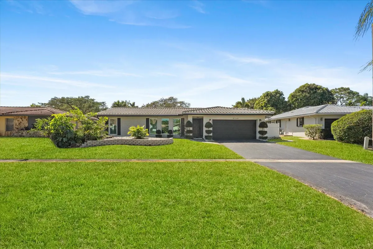 Photo 1 at 8264 Shadow Wood Boulevard, Coral Springs