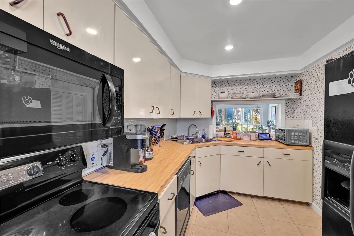 Fully equipped kitchen at 1100 SW 12th Street 108, Fort Lauderdale