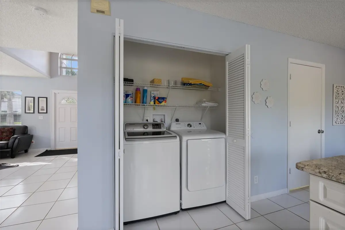 Laundry inside-Closet offt the kitchen at 1628 S Club Drive, Wellington