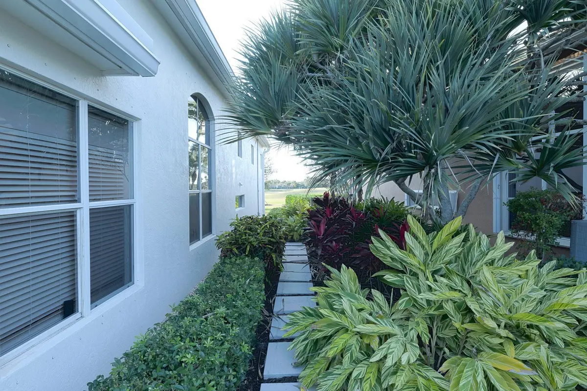 Right side of the house landscaping at 9016 Lakes Boulevard, West Palm Beach