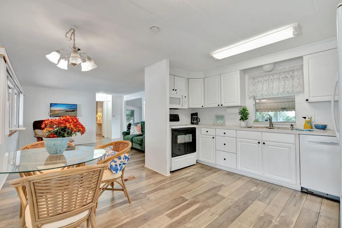 Newer flooring and eat in kitchen at 7184 SE Redbird Circle, Hobe Sound