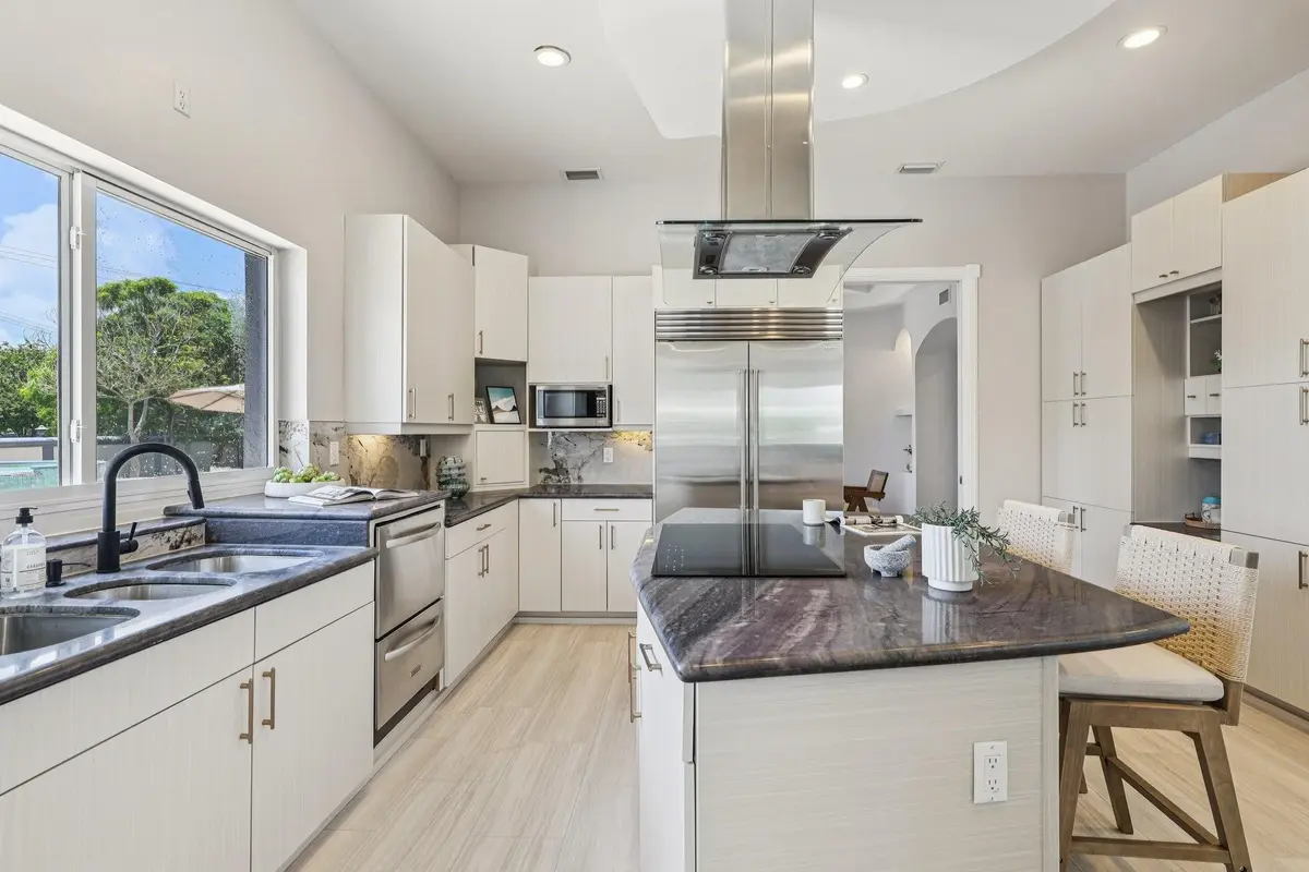 Updated Main Kitchen with new appliances at 3900 NE 23rd Terrace, Lighthouse Point