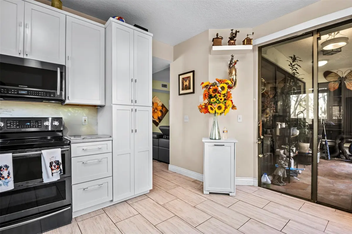 Photo 5 at 7525 NW 61st Terrace 1802, Parkland