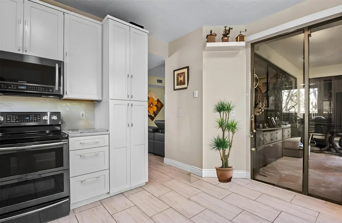 Photo 7 at 7525 NW 61st Terrace 1802, Parkland