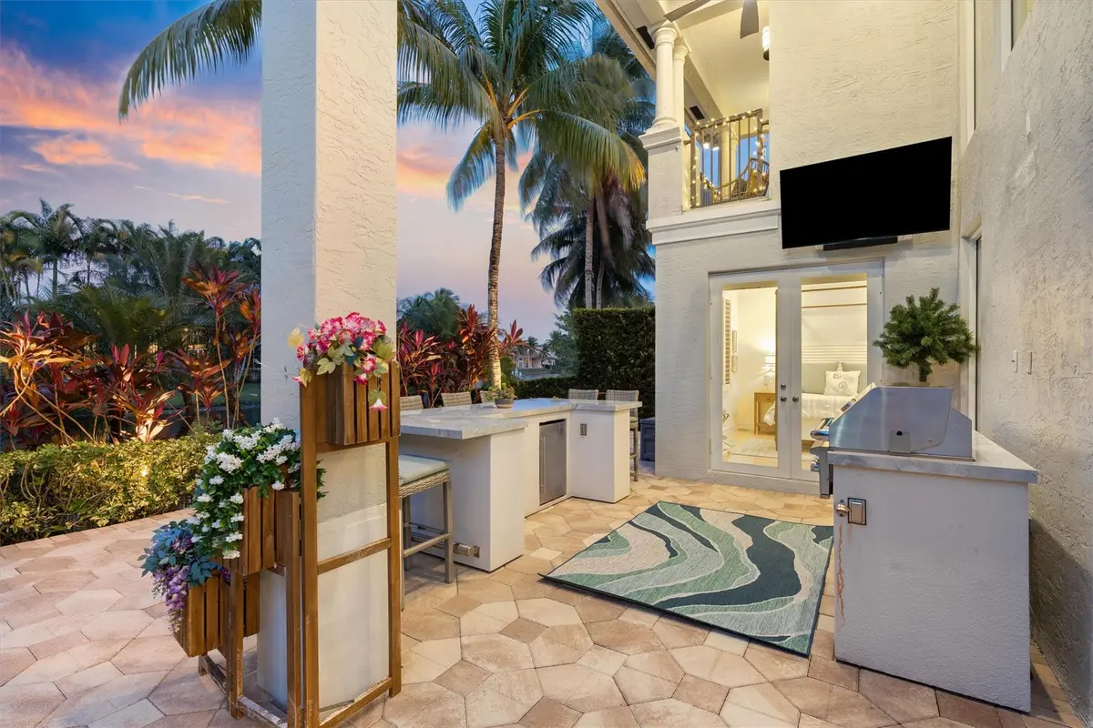 Summer Kitchen with Double Bar and BBQ at 10301 Blue Palm Street, Plantation