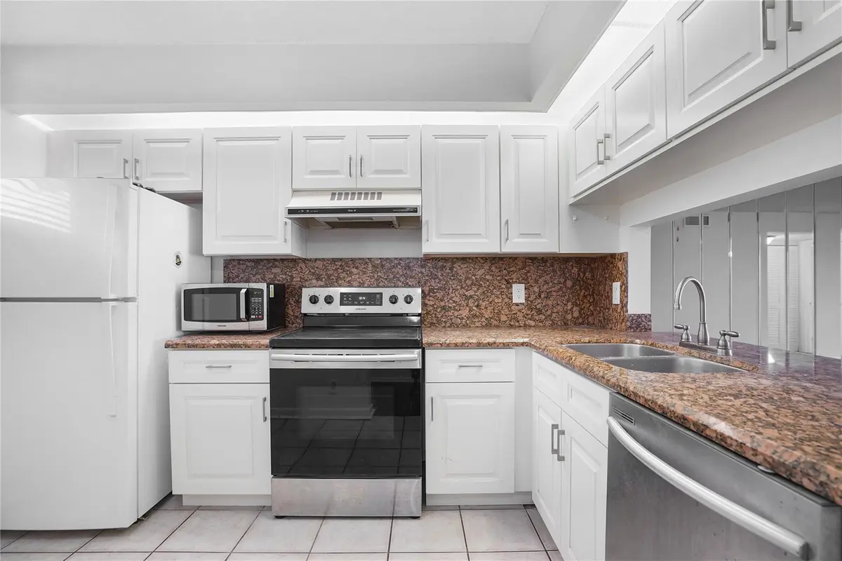 Photo 5 at 109 Lake Emerald Drive 110, Oakland Park