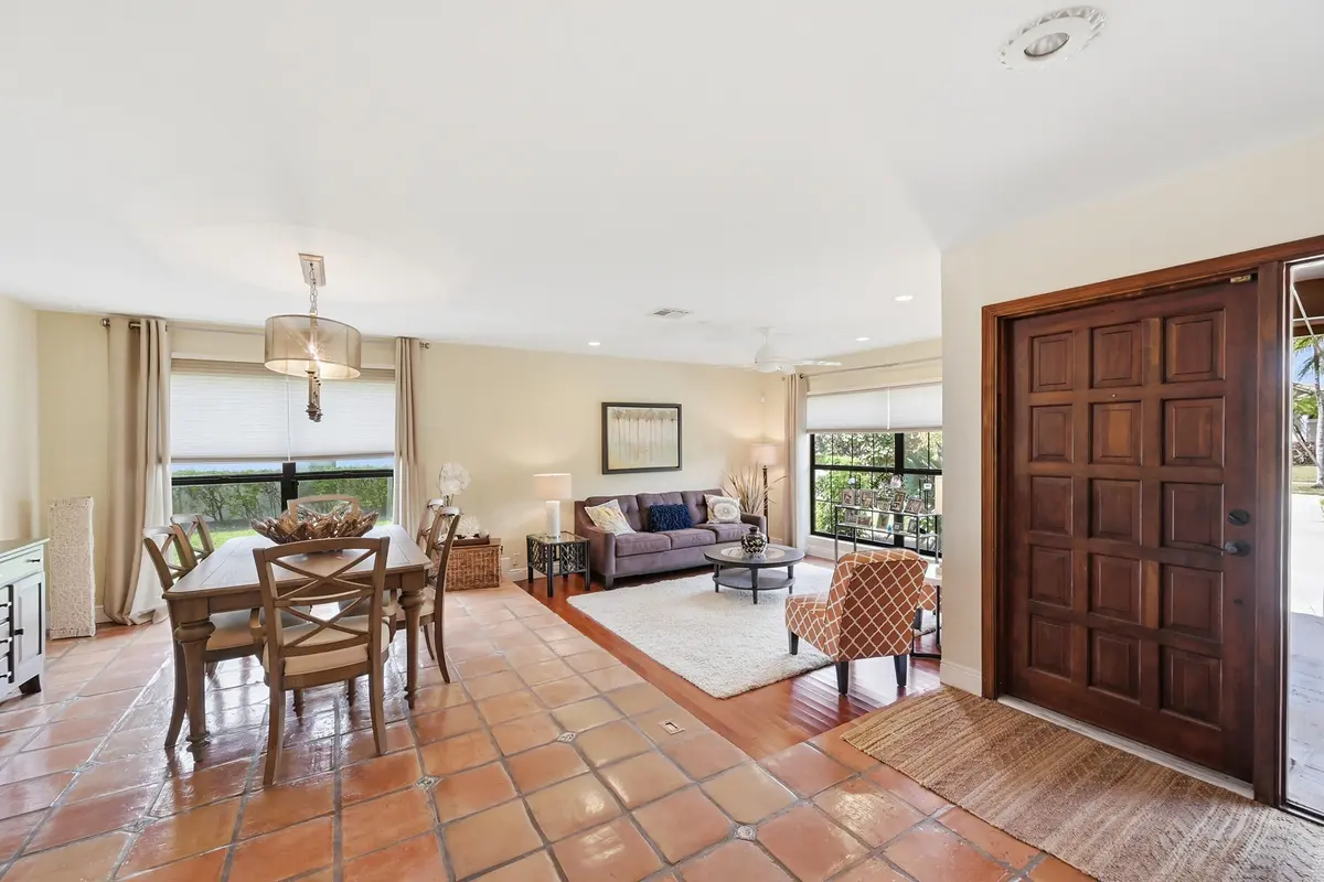Overview dining room and living room at 10152 Harbourtown Court, Boca Raton