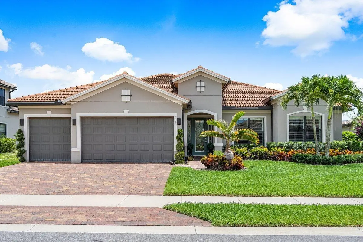 Front elevation at 114 Blanca Isles Lane, Jupiter