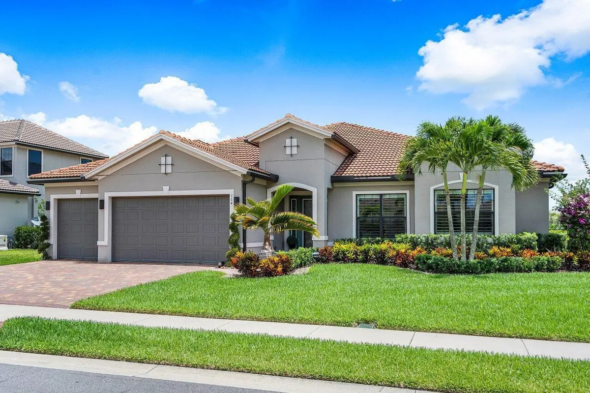 Front elevation at 114 Blanca Isles Lane, Jupiter