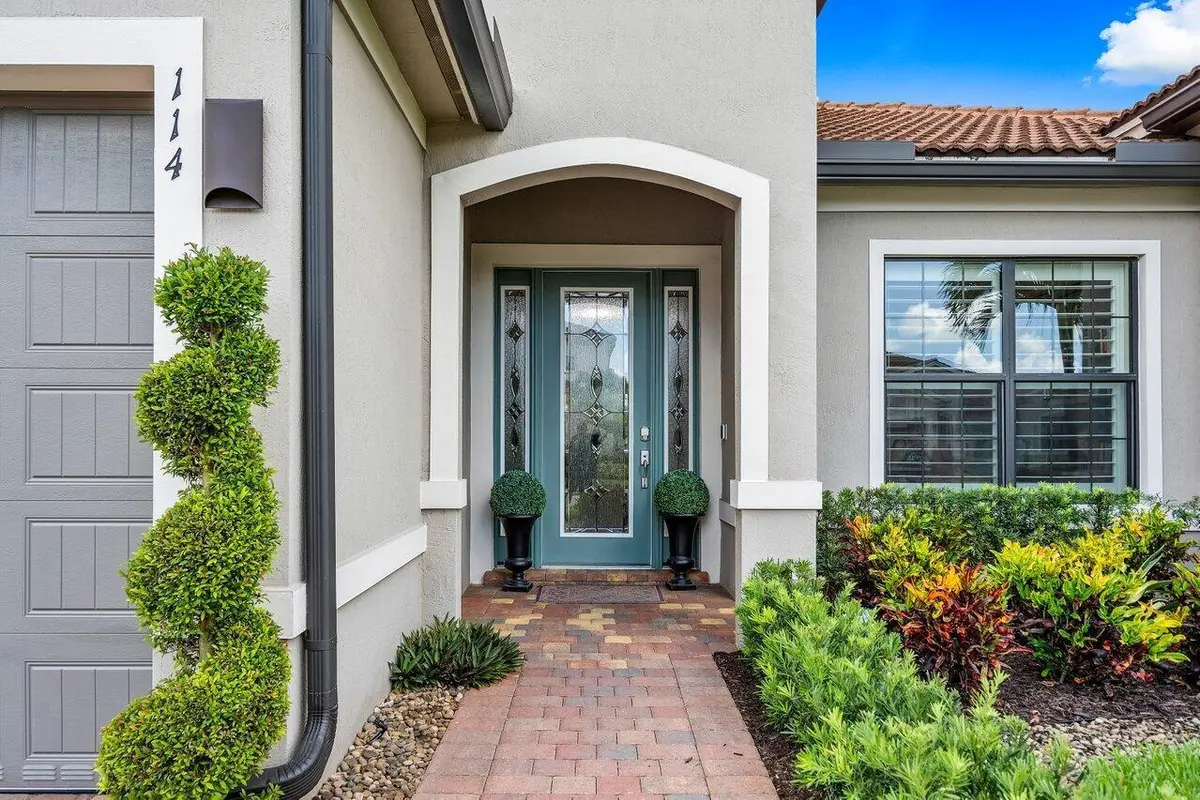 Upgraded glass front door at 114 Blanca Isles Lane, Jupiter