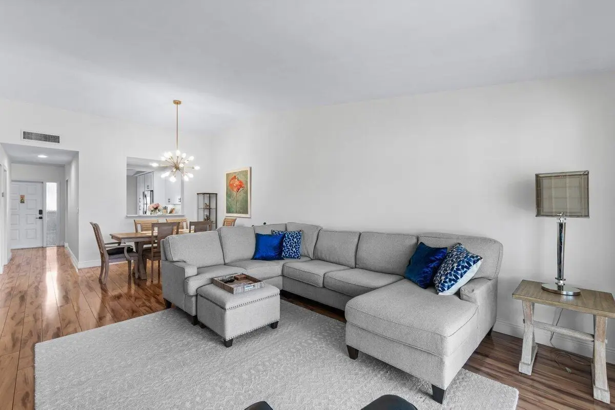 Living & dining room area at 5120 Golfview Court 1722, Delray Beach