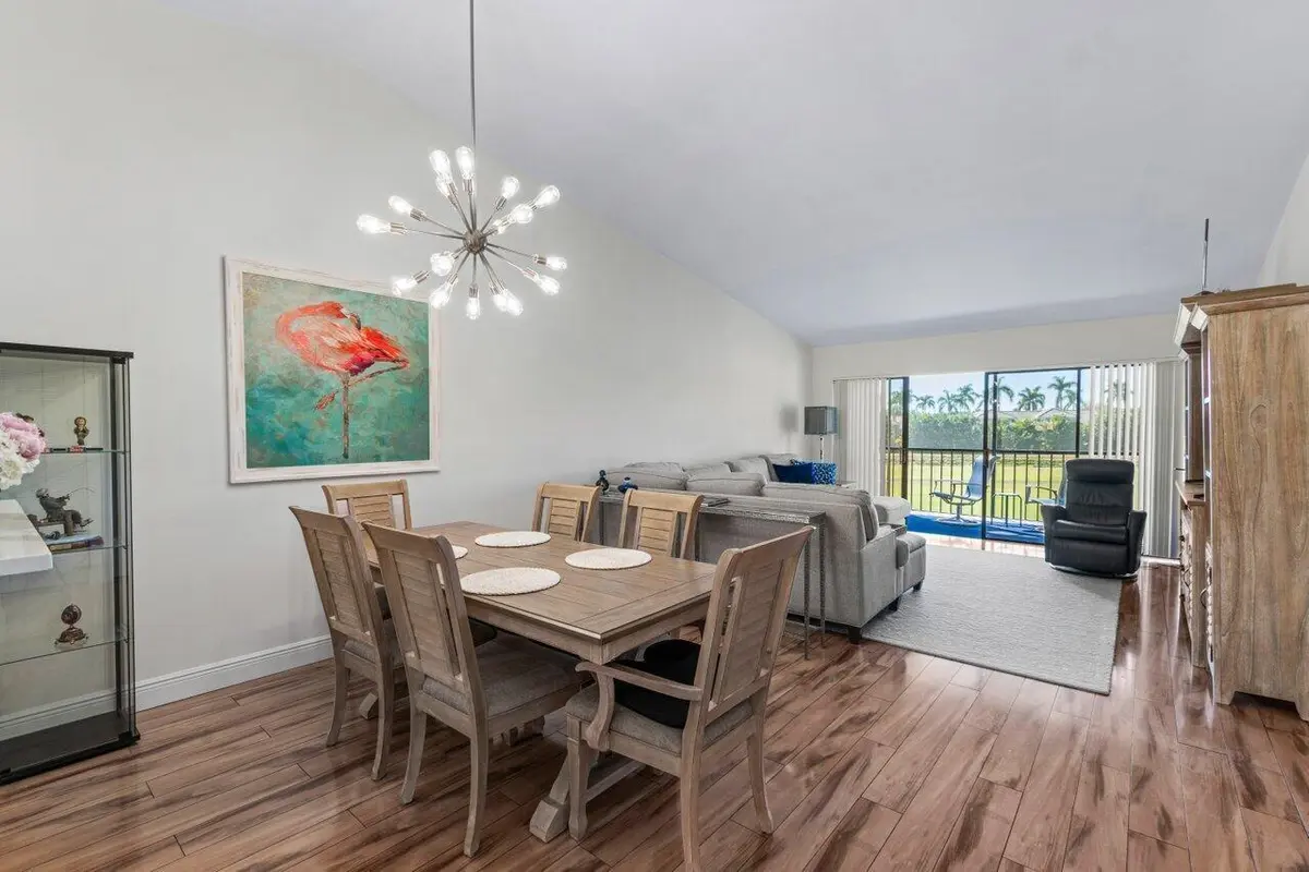 Living & dining room area at 5120 Golfview Court 1722, Delray Beach