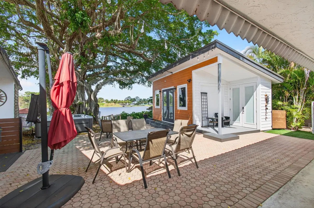 Lush Outdoor Dinning Area at 6647 Paul Mar Drive, Lantana